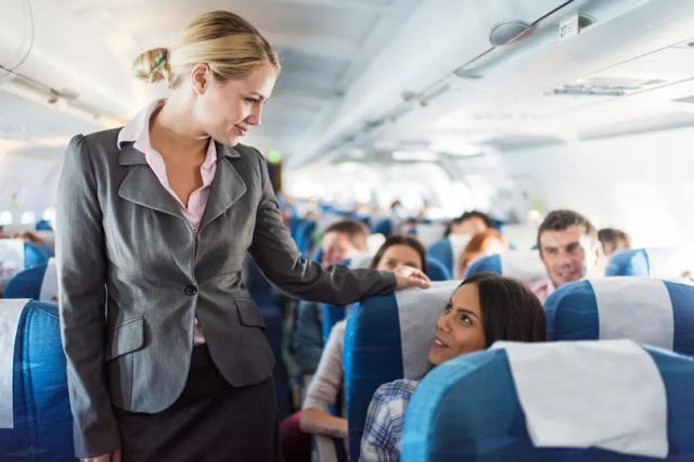 Why Do Flight Attendants Sit on Their Hands? The Little-Known Truth