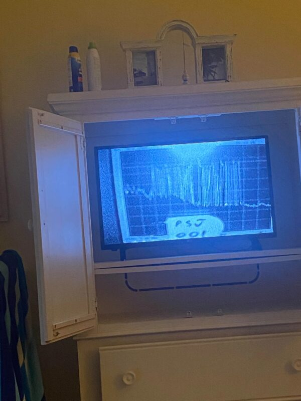 It was late at night, and I was watching the news when suddenly the image disappeared, and the screen went black for a moment