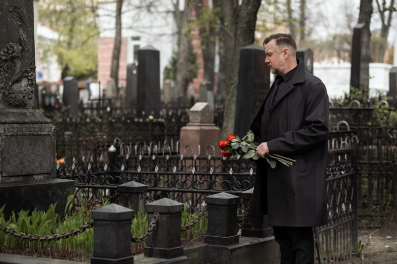 Through the crematorium glass, he noticed his pregnant wife's belly trembling slightly